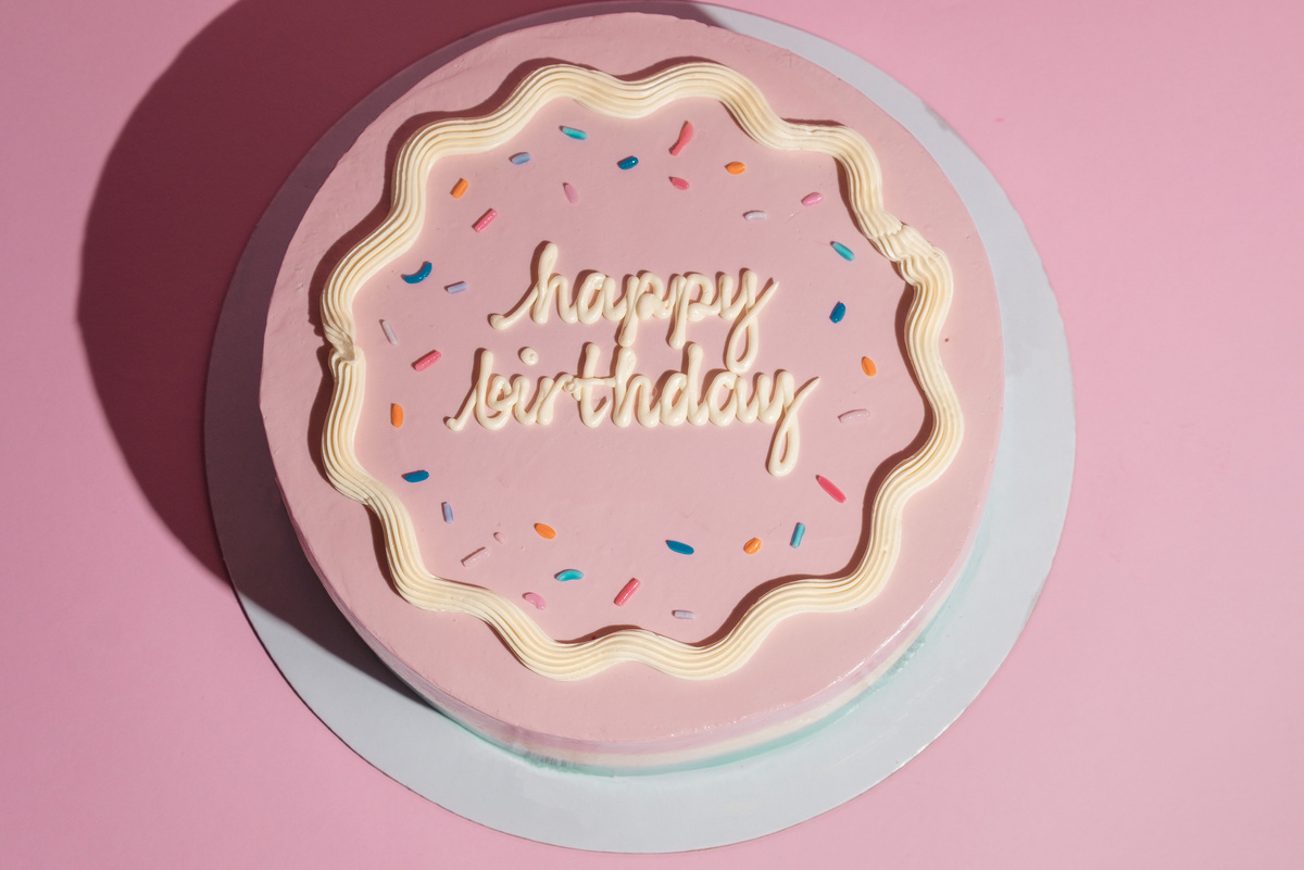 Birthday Cake on Pink Background